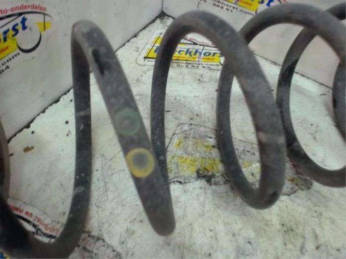 Rear coil spring from a Fiat Bravo (198A) 1.4 T-Jet 16V 120 2007