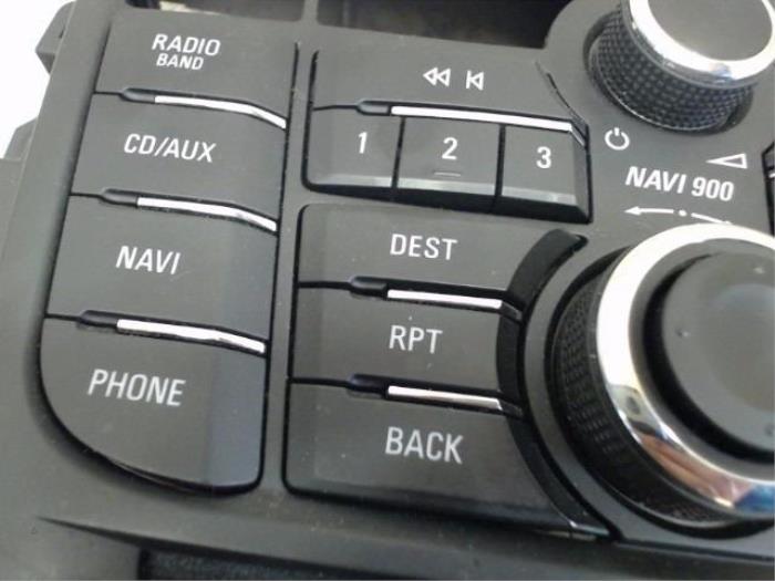 Panneau commande radio d'un Opel Astra J Sports Tourer (PD8/PE8/PF8) 1.3 CDTI 16V ecoFlex 2012
