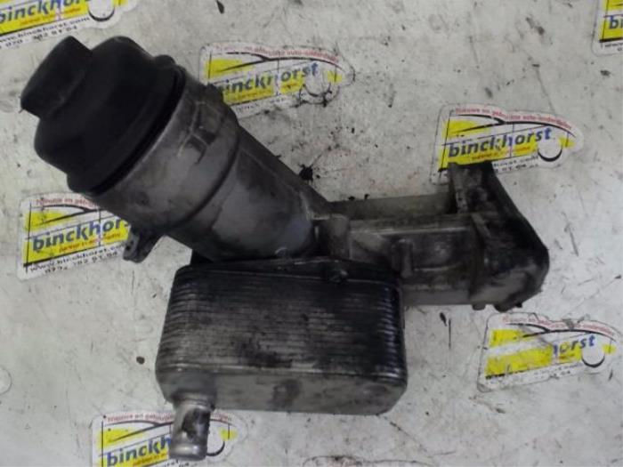 Oil filter housing from a BMW 3 serie Compact (E46/5) 320td 16V 2004