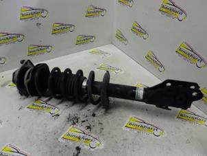 Used Front shock absorber rod, left Daihatsu Cuore (L251/271/276) 1.0 12V DVVT Price € 36,75 Margin scheme offered by Binckhorst BV