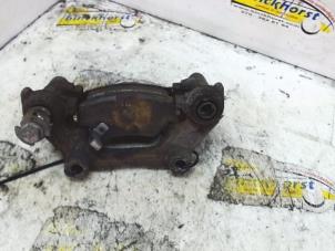 Used Rear brake calliperholder, left Opel Astra G (F08/48) 1.6 16V Price € 21,00 Margin scheme offered by Binckhorst BV