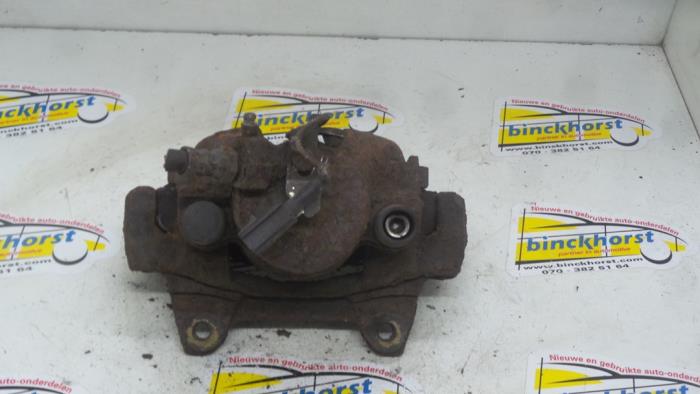 Front brake calliper, left from a Lancia Delta (836) 1.6 16V HPE 1999