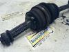 Front drive shaft, left from a Suzuki Swift (SF310/413) 1.3 1990