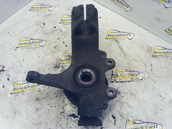 Knuckle, front left from a Ford Focus 2 1.6 16V 2010