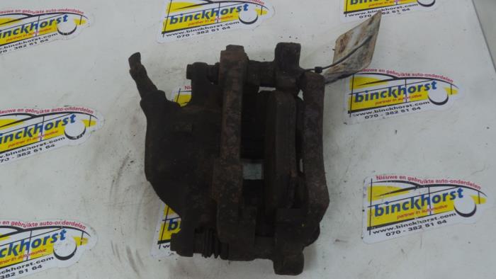 Front brake calliper, left from a Audi 80 (B4) 2.0 E 1994