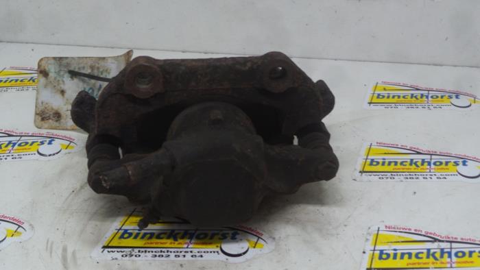 Front brake calliper, left from a Audi 80 (B4) 2.0 E 1994