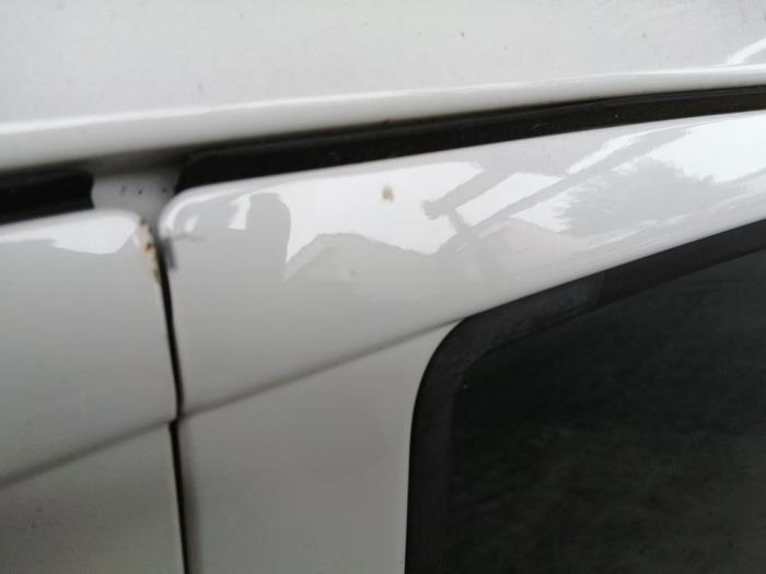 Rear door 4-door, left from a Daihatsu Cuore (L251/271/276) 1.0 12V DVVT 2008