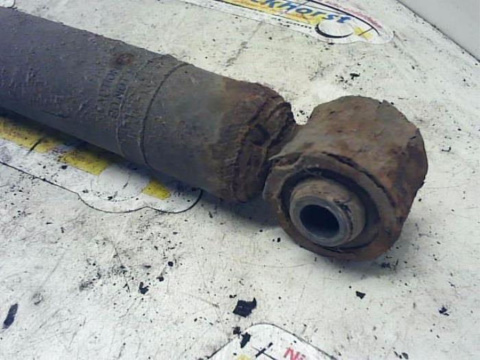 Rear shock absorber, left from a Nissan Micra (K13) 1.2 12V 2011