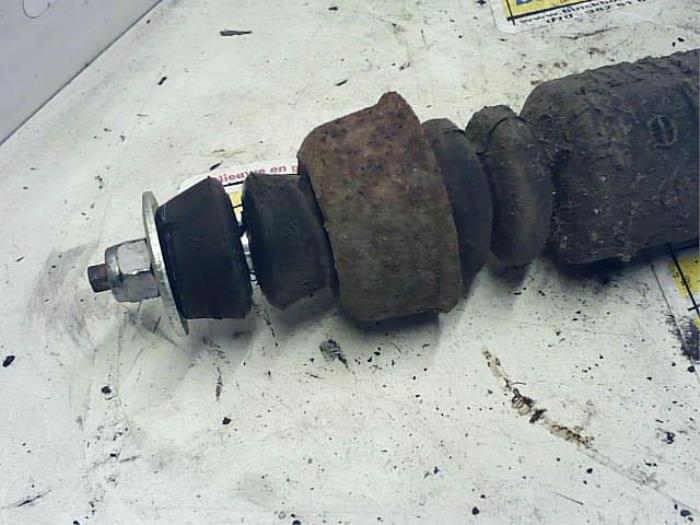 Rear shock absorber, left from a Nissan Micra (K13) 1.2 12V 2011