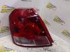 Taillight, left from a Chevrolet Kalos (SF48), 2002 / 2008 1.4 16V, Hatchback, Petrol, 1.399cc, 69kW (94pk), FWD, L14; L485, 2003-05 / 2008-05, SF487 2005