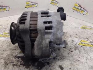 Dynamo van een Honda Civic (EJ/EK) 1.4iS 16V 1998
