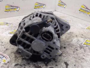 Dynamo van een Honda Civic (EJ/EK) 1.4iS 16V 1998