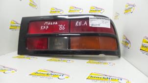 Usados Luz trasera derecha Mazda RX-7 Precio € 42,00 Norma de margen ofrecido por Binckhorst BV