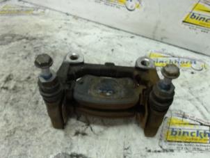 Used Rear brake calliperholder, left Opel Astra H GTC (L08) 1.9 CDTi 16V Price € 15,75 Margin scheme offered by Binckhorst BV