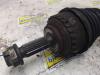 Front drive shaft, left from a Renault Clio II (BB/CB) 1.2 16V 2001