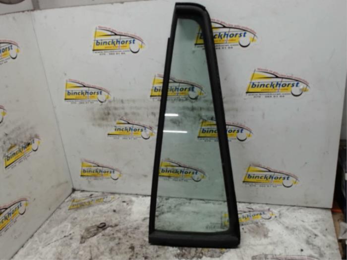 Usados Ventanilla triangular izquierda detrás Mazda 2 (NB/NC/ND/NE) 1.4 16V Precio € 26,25 Norma de margen ofrecido por Binckhorst BV
