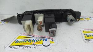 Usados Interruptor de calefactor luneta Chrysler PT Cruiser 2.4 16V Precio € 36,75 Norma de margen ofrecido por Binckhorst BV