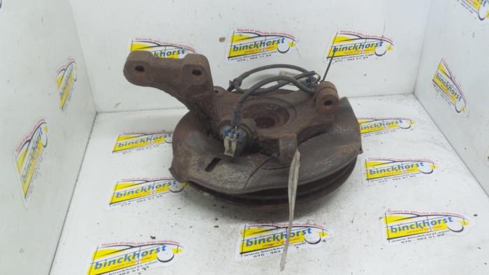 Knuckle, front left from a Daewoo Nubira Wagon (J100) 2.0 16V 1998
