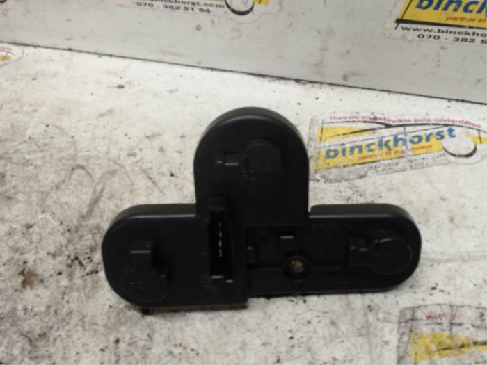 Tail light bulb cover holder