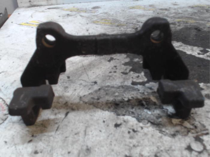 Rear brake calliperholder, left from a Peugeot 508 SW (8E/8U) 1.6 HDiF 16V 2011