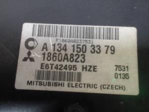 Ignition lock + computer from a Mitsubishi Colt (Z2/Z3) 1.1 12V 2007