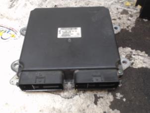 Ignition lock + computer from a Mitsubishi Colt (Z2/Z3) 1.1 12V 2007