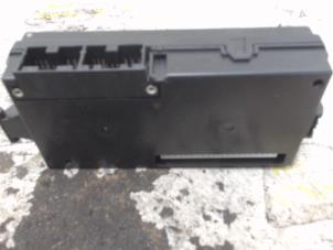 Ignition lock + computer from a Mitsubishi Colt (Z2/Z3) 1.1 12V 2007