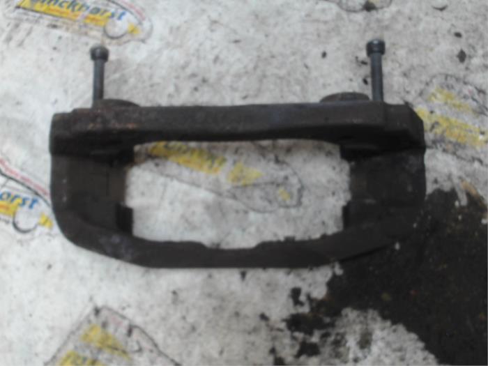 Front brake calliperholder, left from a Mercedes-Benz Sprinter 3,5t (906.73) 316 CDI 16V 2013