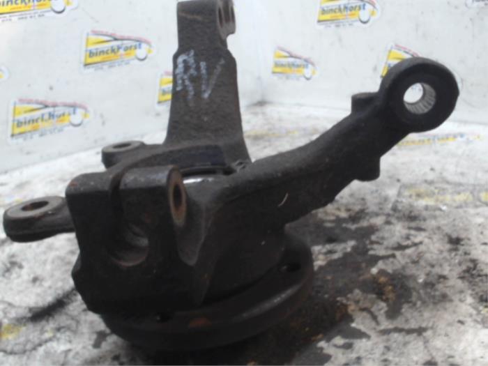 Knuckle, front right from a Nissan Note (E11) 1.4 16V 2006