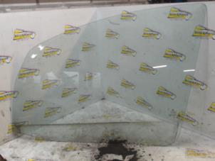 Used Door window 4-door, front left Mitsubishi Colt (Z2/Z3) 1.3 16V Price € 31,50 Margin scheme offered by Binckhorst BV