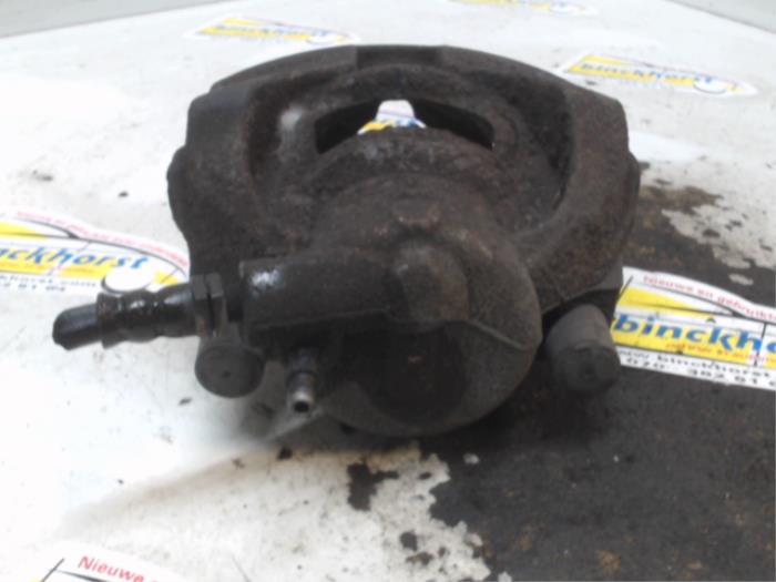 Front brake calliper, left from a Ford Galaxy (WA6) 2.0 TDCi 16V 140 2006