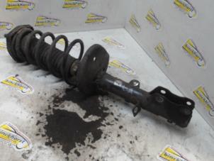 Used Rear shock absorber rod, left Toyota Corolla (E11) 1.6 16V Price € 36,75 Margin scheme offered by Binckhorst BV