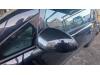 Wing mirror, left from a Opel Corsa D 1.2 16V 2011