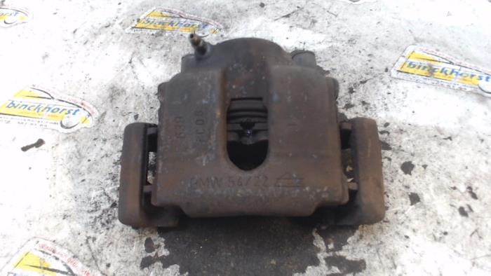 Gebrauchte Bremszange links vorne BMW 3 serie (E46/4) 316i 16V Preis € 26,25 Margenregelung angeboten von Binckhorst BV