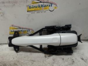 Begagnade Dörrhandtag, 4-dörrars, vänster bak Volvo V60 I (FW/GW) 2.4 D6 20V Plug-in Hybrid AWD Pris € 21,00 Marginaltabell erbjuds av Binckhorst BV