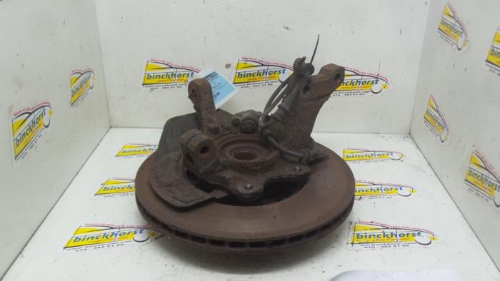 Knuckle, front left from a Opel Vectra B (36) 2.5 V6 24V 1996