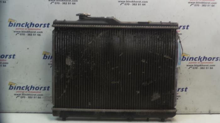 Used Radiator Toyota Corolla (E10) 1.6 i 16V Price € 42,00 Margin scheme offered by Binckhorst BV