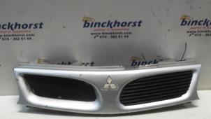 Used Grille Mitsubishi Carisma 1.8 GDI 16V Price € 21,00 Margin scheme offered by Binckhorst BV