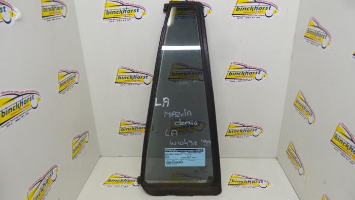 Usados Ventanilla triangular izquierda detrás Mazda Demio (DW) 1.3 16V Precio € 31,50 Norma de margen ofrecido por Binckhorst BV