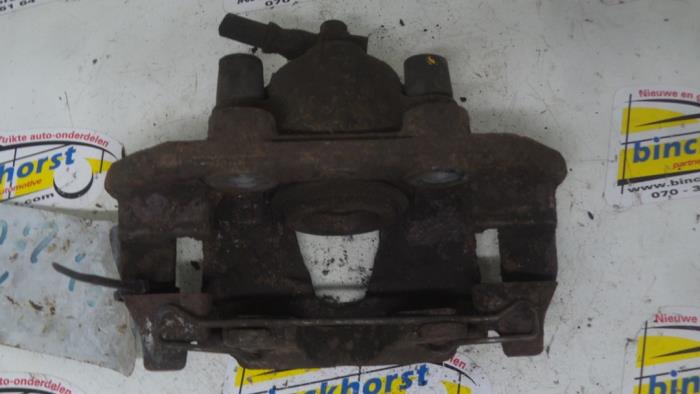 Front brake calliper, left from a Opel Vectra 1991