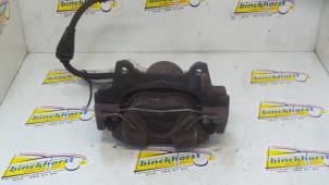 Used Front brake calliper, left Fiat Punto II (188) 1.2 16V 3-Drs. Price € 26,25 Margin scheme offered by Binckhorst BV