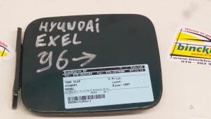 Usados Tapa de depósito Hyundai Excel Precio € 21,00 Norma de margen ofrecido por Binckhorst BV