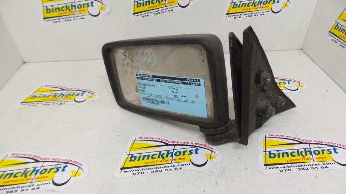 Wing mirror, left from a Nissan Sunny 1988