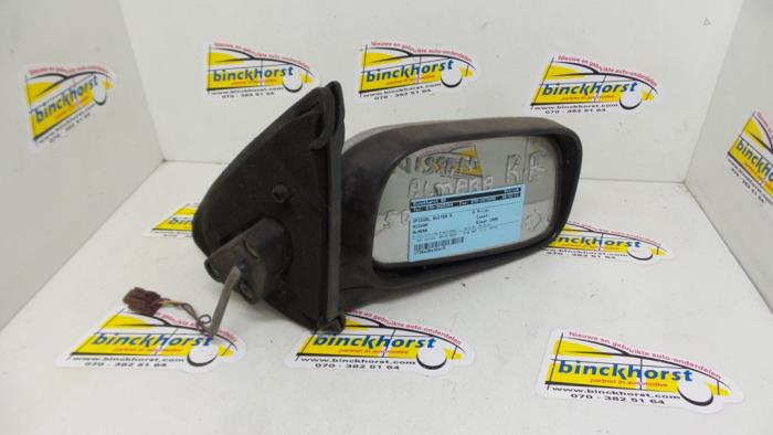 Wing mirror, right from a Nissan Almera 1999