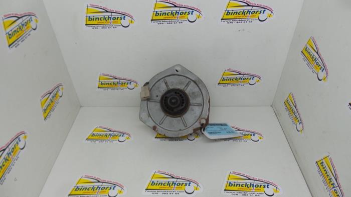 Heating and ventilation fan motor from a Suzuki Alto 1990