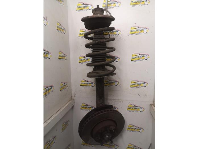 Front shock absorber rod, left from a Volvo 940 I Estate 2.3i 1992