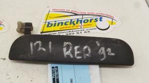 Usagé Poignée de porte arrière droite Mazda 121 Prix € 15,75 Règlement à la marge proposé par Binckhorst BV
