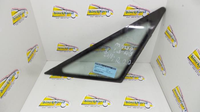 Usados Ventanilla triangular derecha detrás Mazda 626 Precio € 26,25 Norma de margen ofrecido por Binckhorst BV