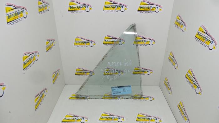 Usados Ventanilla triangular derecha detrás Mazda 626 Precio € 26,25 Norma de margen ofrecido por Binckhorst BV