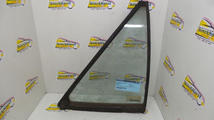 Usados Ventanilla triangular derecha detrás Mitsubishi Galant Precio € 26,25 Norma de margen ofrecido por Binckhorst BV